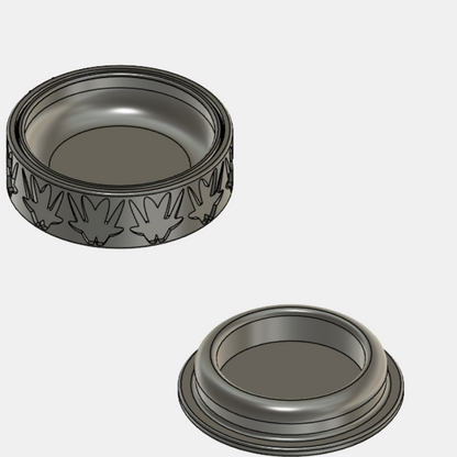 Two metallic rings with embossed patterns on a white background